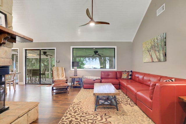 221 Kings Way, Coldspring, TX 77331 - living area with a ceiling fan, lofted ceiling, healthy amount of natural light, and wood finished floors