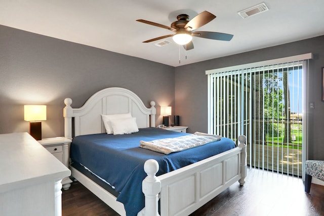 221 Kings Way, Coldspring, TX 77331 - bedroom featuring dark wood-style flooring, access to exterior, and a ceiling fan