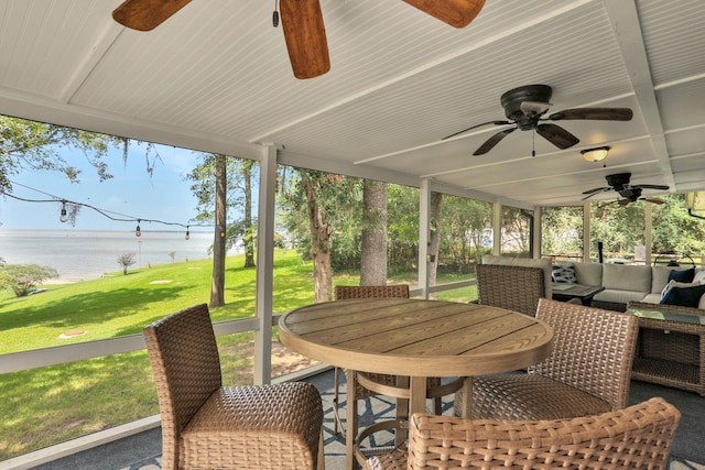 221 Kings Way, Coldspring, TX 77331 - view of patio / terrace with a water view, ceiling fan, outdoor lounge area, and outdoor dining area