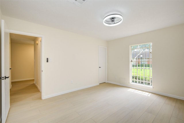 12803 High Star Dr, Houston, TX 77072 - unfurnished room featuring healthy amount of natural light and light wood finished floors