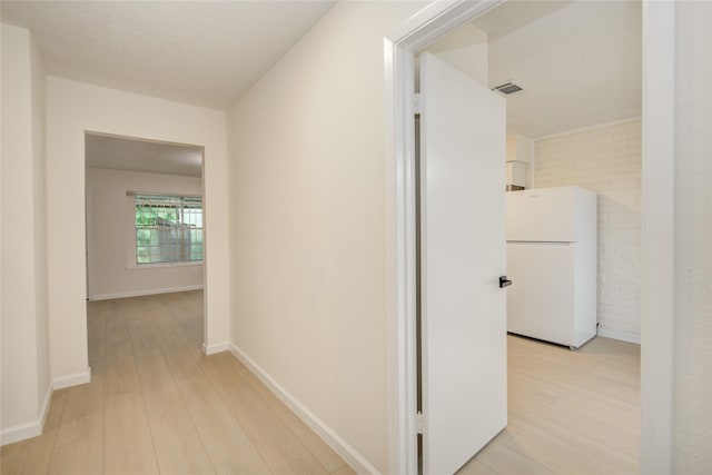 12803 High Star Dr, Houston, TX 77072 - corridor featuring light wood-style flooring and baseboards