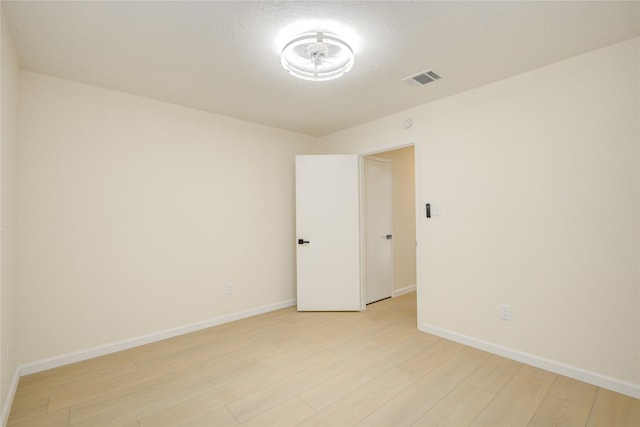 12803 High Star Dr, Houston, TX 77072 - empty room featuring light wood finished floors and baseboards