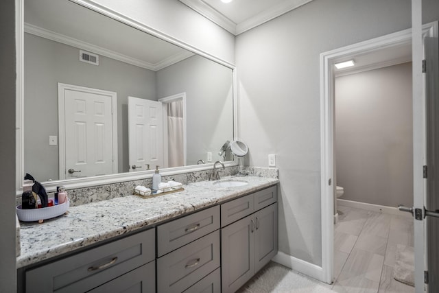 248 Wilcrest Dr Unit 248, Houston, TX 77042 - bathroom featuring vanity, crown molding, and marble finish floors