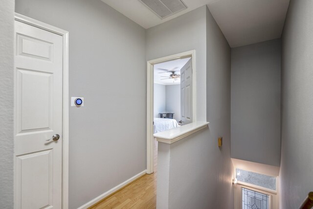 248 Wilcrest Dr Unit 248, Houston, TX 77042 - hall with light wood-style flooring and baseboards