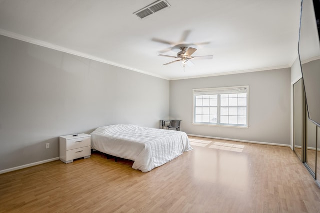 248 Wilcrest Dr Unit 248, Houston, TX 77042 - bedroom featuring crown molding, wood finished floors, and ceiling fan