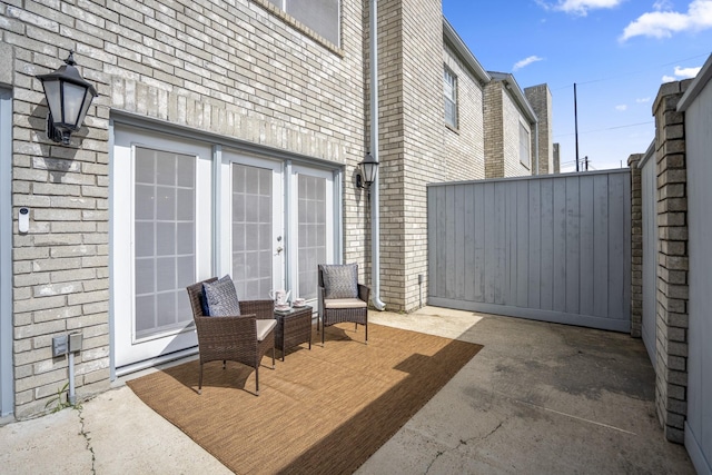 248 Wilcrest Dr Unit 248, Houston, TX 77042 - view of patio featuring french doors