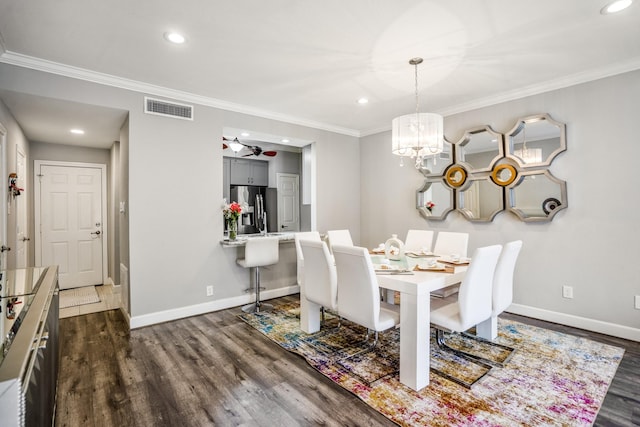 248 Wilcrest Dr Unit 248, Houston, TX 77042 - dining area with dark wood-style flooring, ornamental molding, a chandelier, recessed lighting, and ceiling fan