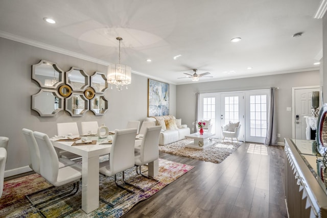 248 Wilcrest Dr Unit 248, Houston, TX 77042 - dining area with ornamental molding, dark wood finished floors, ceiling fan, recessed lighting, and a chandelier