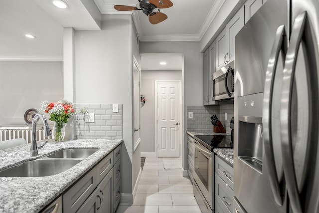 248 Wilcrest Dr Unit 248, Houston, TX 77042 - kitchen featuring stainless steel appliances, gray cabinetry, ornamental molding, decorative backsplash, and recessed lighting