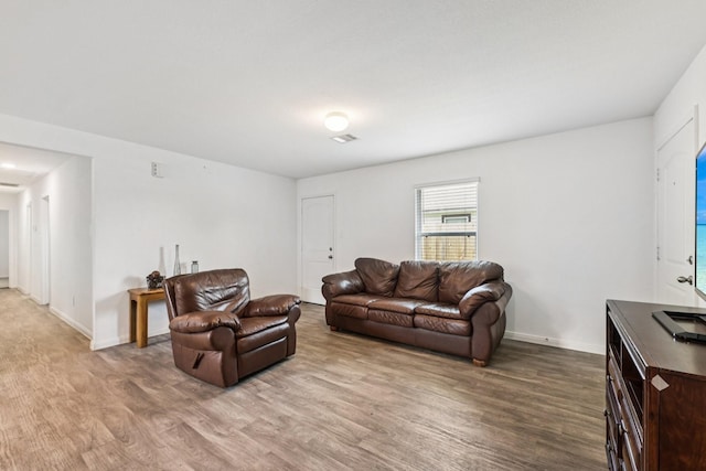 852 Rd 5138, Cleveland, TX 77327 - living area featuring wood finished floors