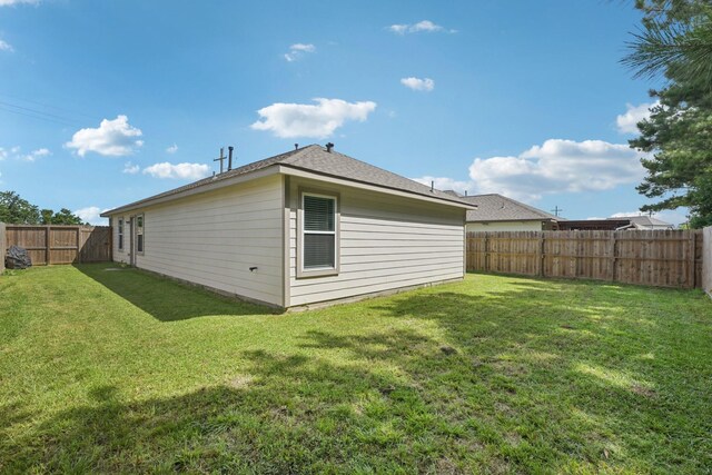 852 Rd 5138, Cleveland, TX 77327 - rear view of property with a fenced backyard