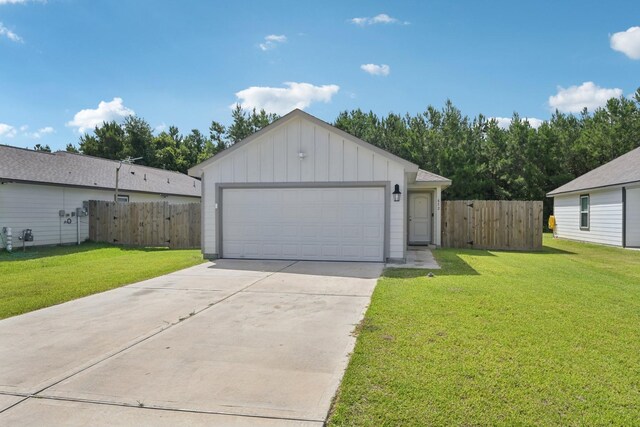 852 Rd 5138, Cleveland, TX 77327 - view of front of home featuring board and batten siding and driveway