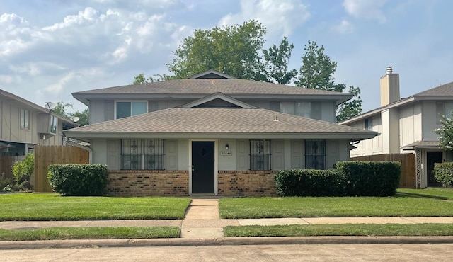 5664 Birchmont Dr Unit 4, Houston, TX 77091 - view of front of property featuring brick siding and roof with shingles