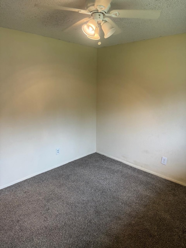 5664 Birchmont Dr Unit 4, Houston, TX 77091 - empty room featuring dark carpet, a textured ceiling, and a ceiling fan