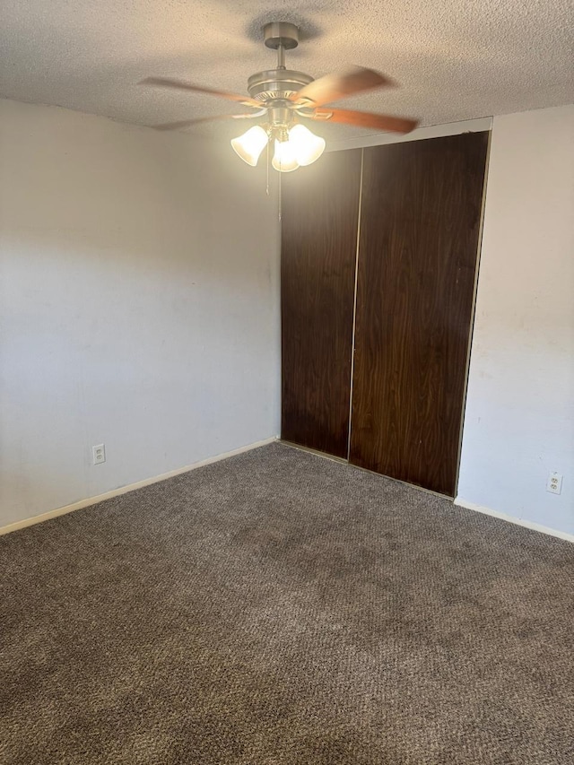 5664 Birchmont Dr Unit 4, Houston, TX 77091 - carpeted empty room with a textured ceiling and ceiling fan