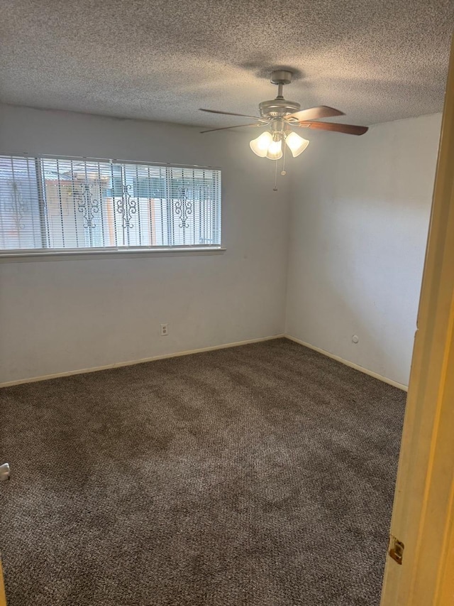 5664 Birchmont Dr Unit 4, Houston, TX 77091 - empty room featuring carpet flooring, a ceiling fan, and a textured ceiling