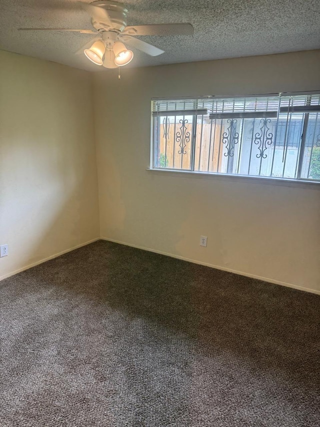 5664 Birchmont Dr Unit 4, Houston, TX 77091 - spare room with healthy amount of natural light, carpet flooring, a ceiling fan, and a textured ceiling