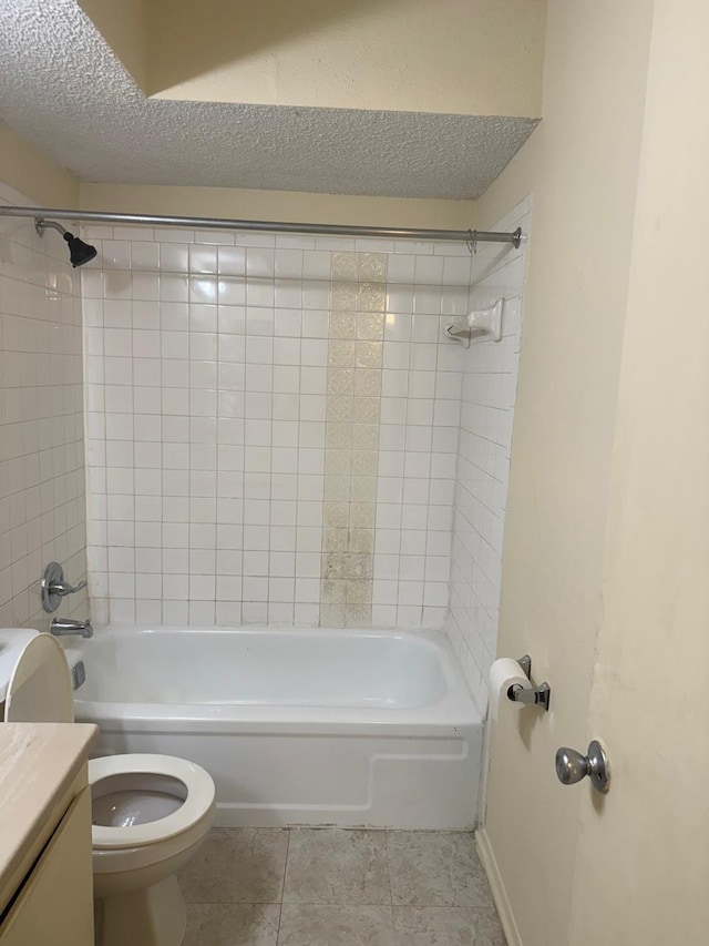 5664 Birchmont Dr Unit 4, Houston, TX 77091 - bathroom featuring tile patterned flooring, vanity, bathing tub / shower combination, and a textured ceiling