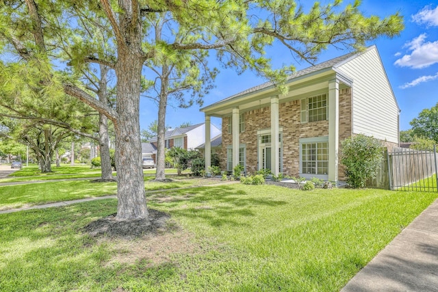 10410 Dude Rd, Houston, TX 77064 - greek revival inspired property featuring brick siding