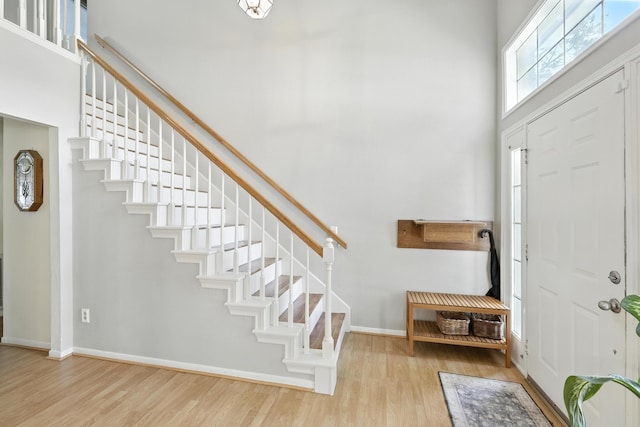 10410 Dude Rd, Houston, TX 77064 - entryway featuring wood finished floors, stairs, and a high ceiling