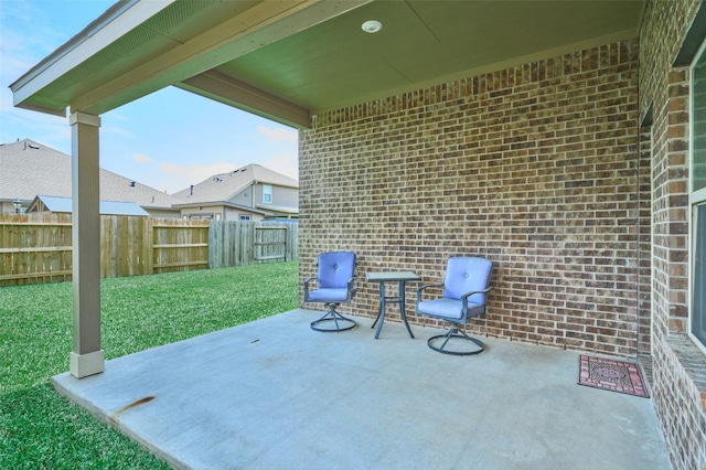 18811 Palmetto Hills Dr, New Caney, TX 77357 - fenced backyard featuring a patio