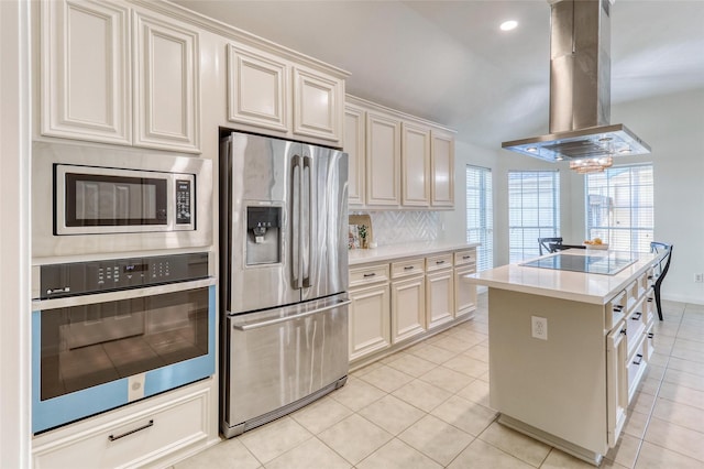 23314 Dunhill Ct, Katy, TX 77494 - kitchen featuring stainless steel appliances, island range hood, tasteful backsplash, light tile patterned floors, and light countertops