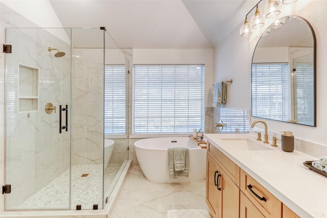 23314 Dunhill Ct, Katy, TX 77494 - full bathroom with vanity, a marble finish shower, a soaking tub, marble tiled floors, and lofted ceiling