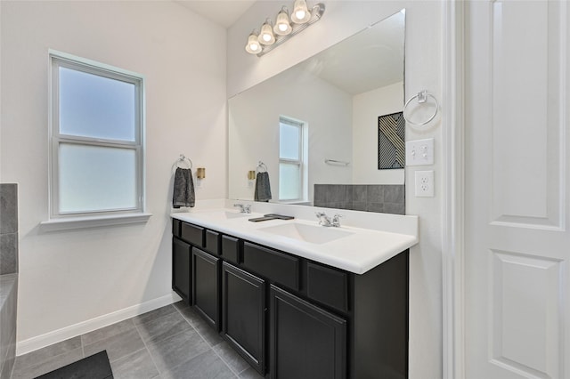 15023 Winter Valley Ct, Humble, TX 77396 - bathroom with double vanity and tile patterned floors