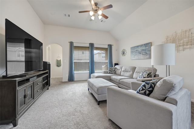 15023 Winter Valley Ct, Humble, TX 77396 - living room with arched walkways, a ceiling fan, light colored carpet, and lofted ceiling