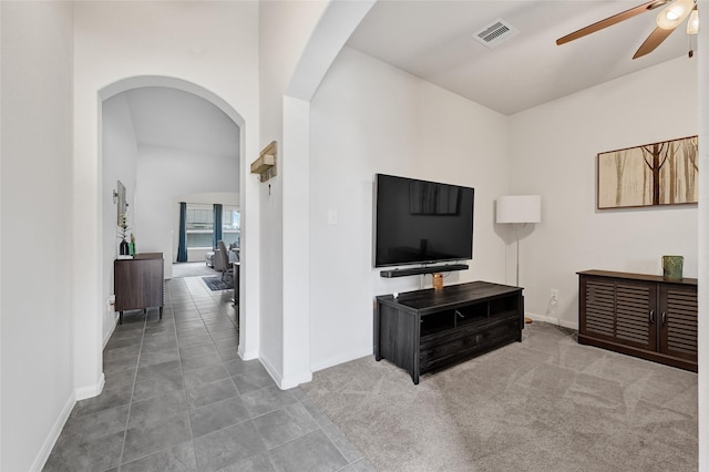 15023 Winter Valley Ct, Humble, TX 77396 - living area featuring arched walkways and a ceiling fan
