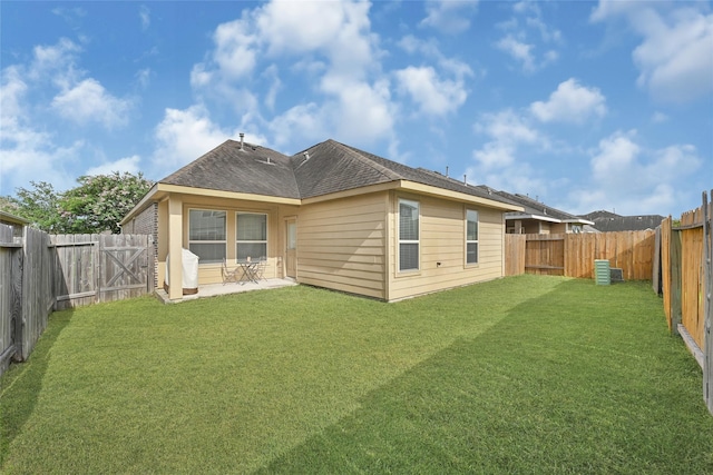 15023 Winter Valley Ct, Humble, TX 77396 - back of property featuring a patio, a fenced backyard, and roof with shingles