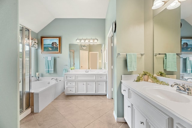 519 Ivory Stone Ln, League City, TX 77573 - full bath featuring two vanities, a bath, tile patterned floors, lofted ceiling, and a stall shower