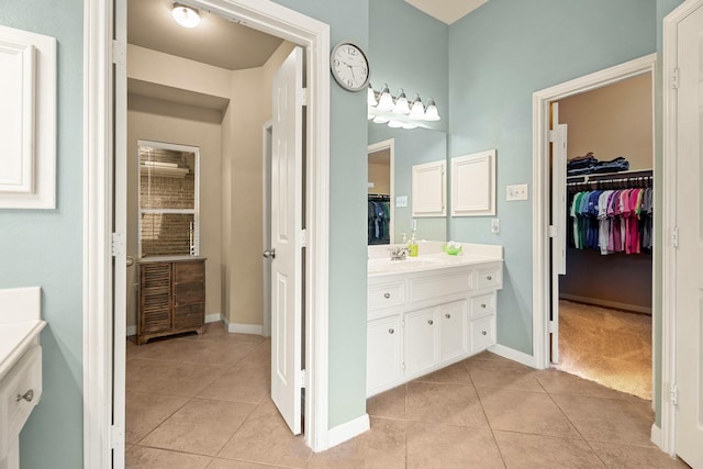 519 Ivory Stone Ln, League City, TX 77573 - full bath with vanity, tile patterned flooring, and a spacious closet