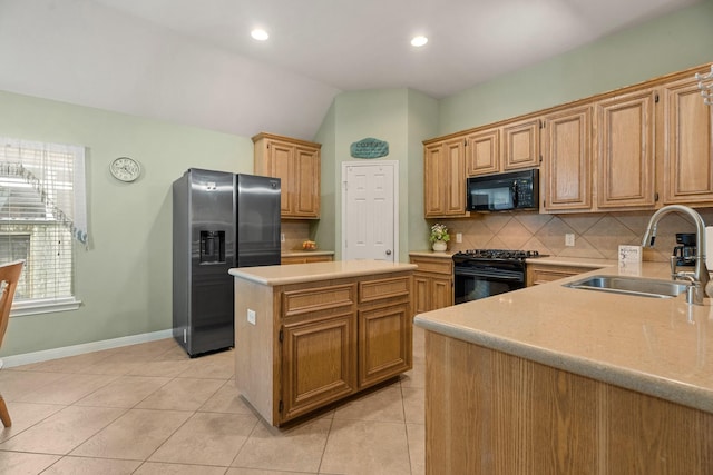 519 Ivory Stone Ln, League City, TX 77573 - kitchen featuring black appliances, backsplash, a center island, light tile patterned flooring, and vaulted ceiling