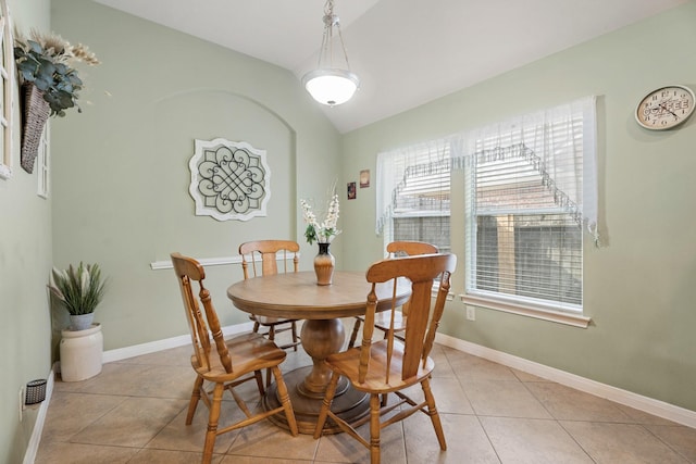 519 Ivory Stone Ln, League City, TX 77573 - dining space with lofted ceiling and light tile patterned floors