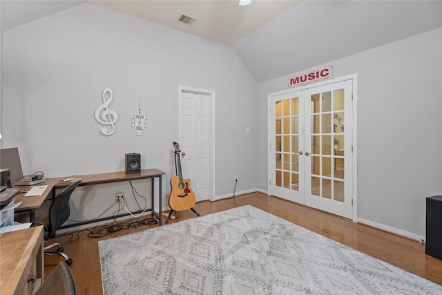 519 Ivory Stone Ln, League City, TX 77573 - office area with french doors, lofted ceiling, and wood finished floors
