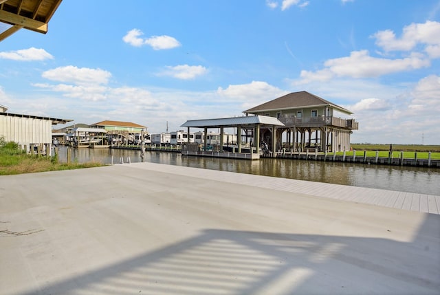 1229 N Stingaree Dr, Crystal Beach, TX 77650 - dock featuring a water view