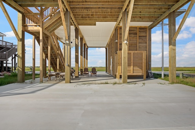 1229 N Stingaree Dr, Crystal Beach, TX 77650 - view of patio / terrace with stairs