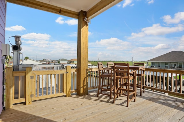 1229 N Stingaree Dr, Crystal Beach, TX 77650 - deck with a residential view and a water view