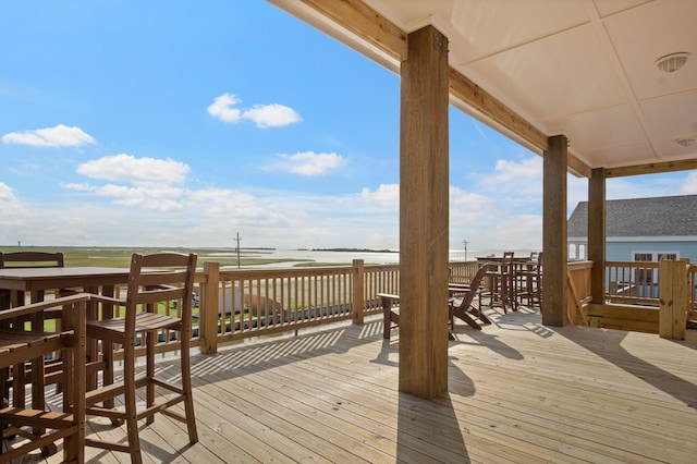 1229 N Stingaree Dr, Crystal Beach, TX 77650 - wooden deck with a water view