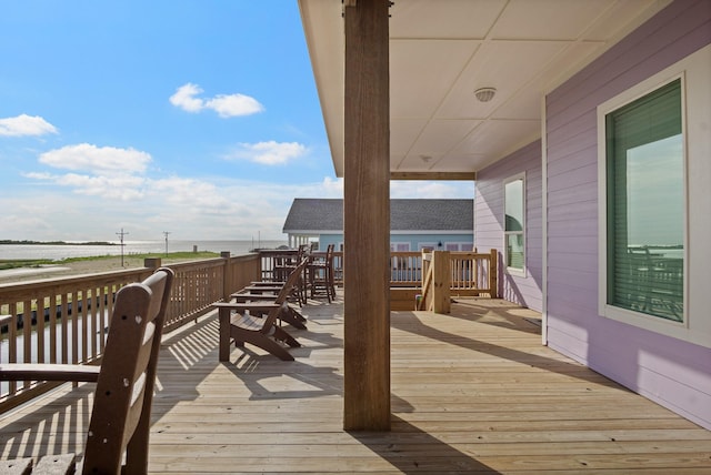 1229 N Stingaree Dr, Crystal Beach, TX 77650 - wooden terrace featuring a water view