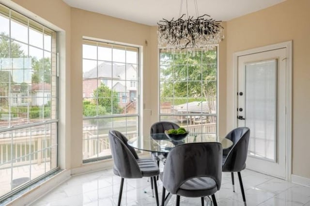 20522 Riverside Pines Dr, Houston, TX 77346 - dining room with light marble finish flooring and plenty of natural light