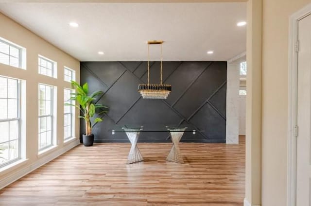 20522 Riverside Pines Dr, Houston, TX 77346 - game room with wood finished floors, an accent wall, and recessed lighting