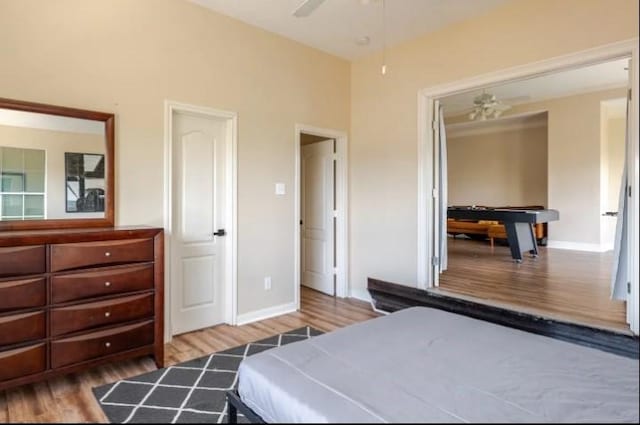 20522 Riverside Pines Dr, Houston, TX 77346 - bedroom with wood finished floors and baseboards