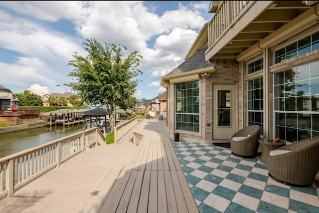 20522 Riverside Pines Dr, Houston, TX 77346 - wooden terrace featuring a water view