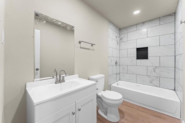 3626 Sparrow St, Houston, TX 77051 - bathroom with wood finished floors, vanity, tub / shower combination, and recessed lighting