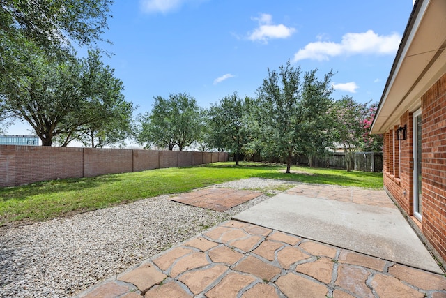 21002 Pineda Cir, Richmond, TX 77406 - fenced backyard with a patio