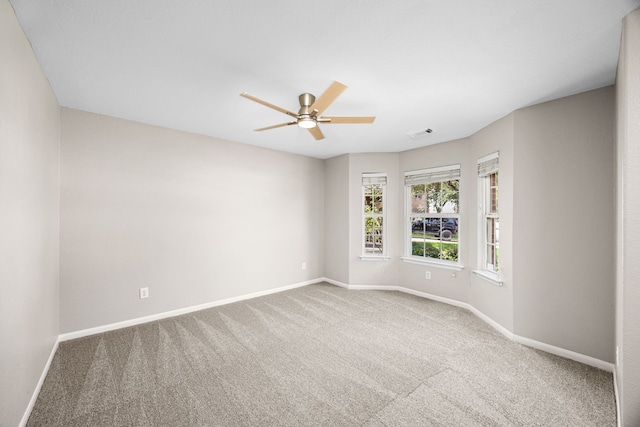 21002 Pineda Cir, Richmond, TX 77406 - carpeted empty room with a ceiling fan and baseboards