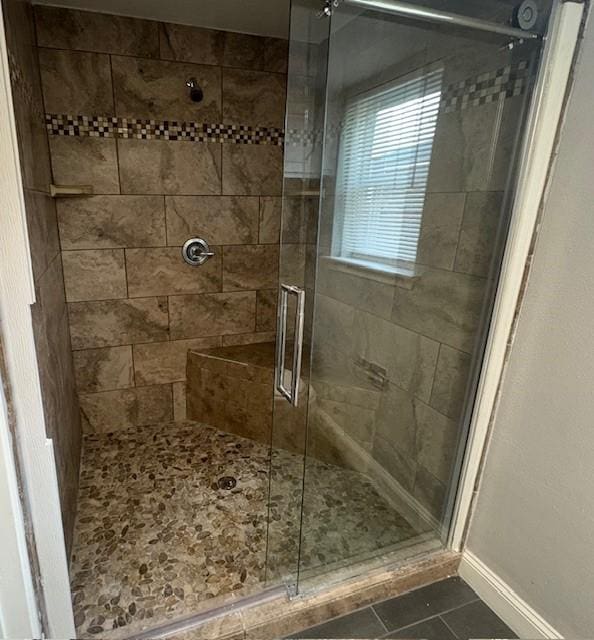 12127 Rhinebeck Dr, Houston, TX 77089 - full bathroom featuring a shower stall and tile patterned floors