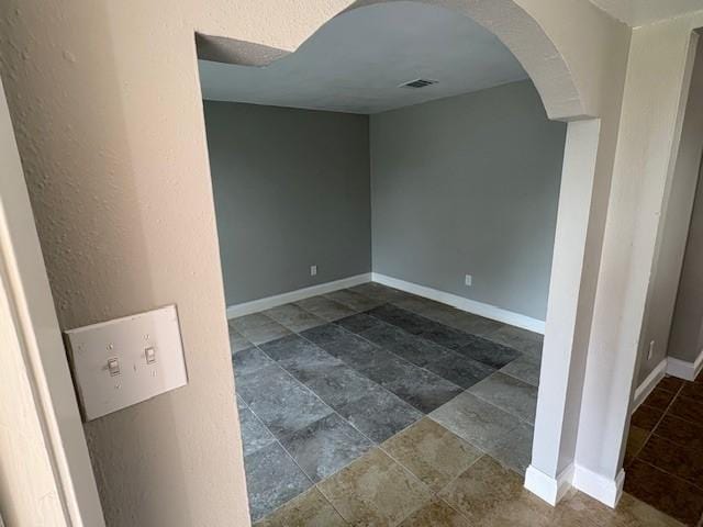 12127 Rhinebeck Dr, Houston, TX 77089 - unfurnished room with arched walkways and baseboards